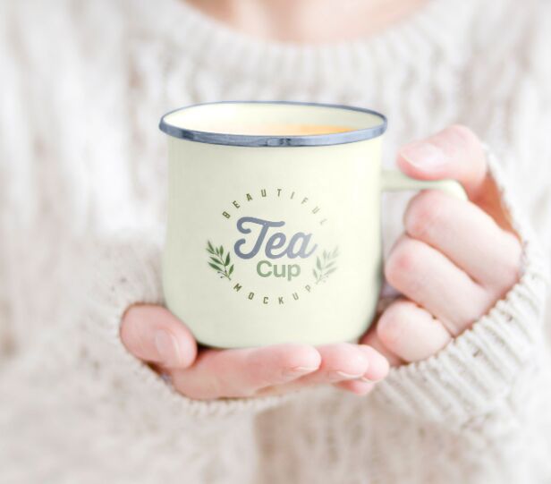 Female Holding Tea Cup Free Mockup PSD