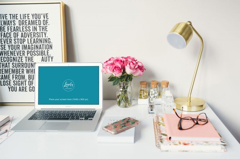 Macbook Air With Roses On A Table