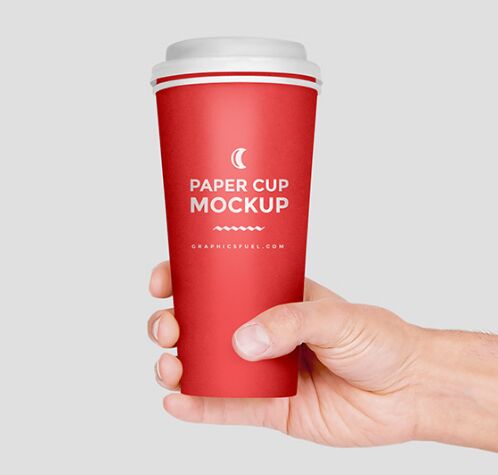 Paper Cup In Hand Mockup PSD