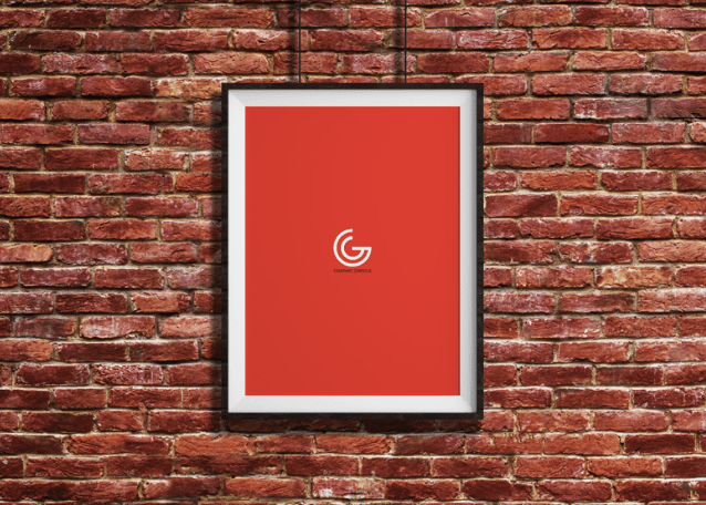 Free Bricks Wall Hanging Frame Poster Mockup PSD