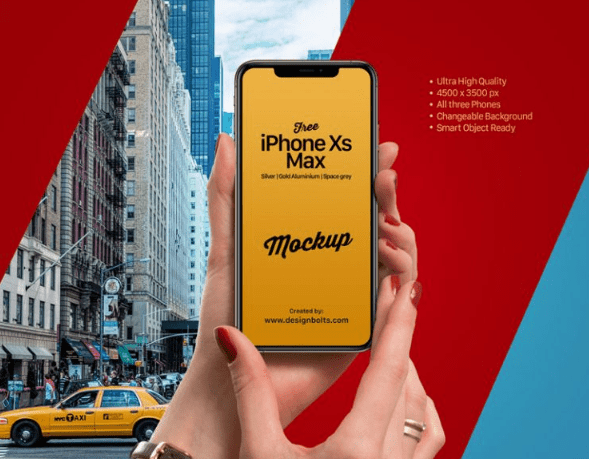 Free iPhone Xs Max in Female Hand Mockup PSD